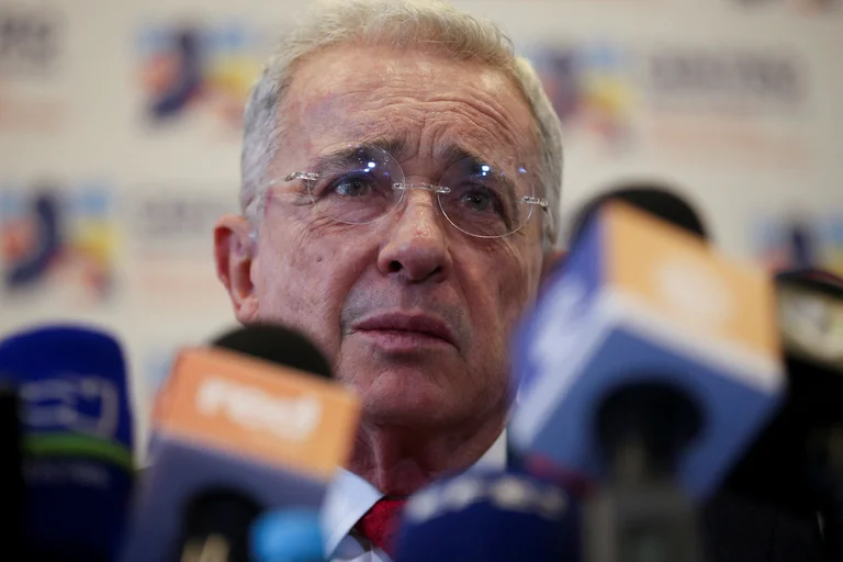 FILE PHOTO: Colombia's former president Alvaro Uribe reacts to the media after his meeting with President-elect Gustavo Petro in Bogota, Colombia June 29, 2022. REUTERS/Luisa Gonzalez/File Photo