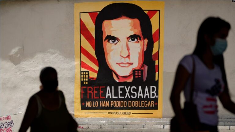 Captura de Un afiche del empresario colombiano y enviado especial venezolano Alex Saab, en Caracas, Venezuela, el 9 de septiembre de 2021.