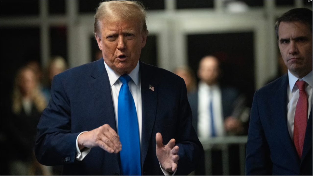 Former US president and Republican presidential candidate Donald Trump speaks to the press during his trial for allegedly covering up hush money payments linked to extramarital affairs at Manhattan Criminal Court in New York on April 22, 2024.